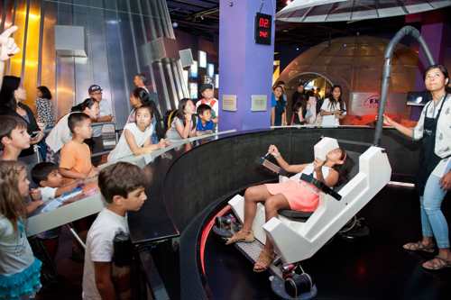 Space Exploration exhibit with jet pack simulator at The Tech Interactive