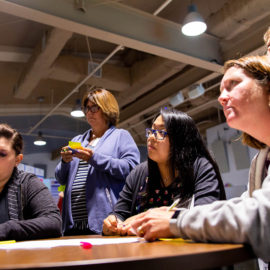 Educators participating in a reflection activity for The Tech Academies Fellowship program.